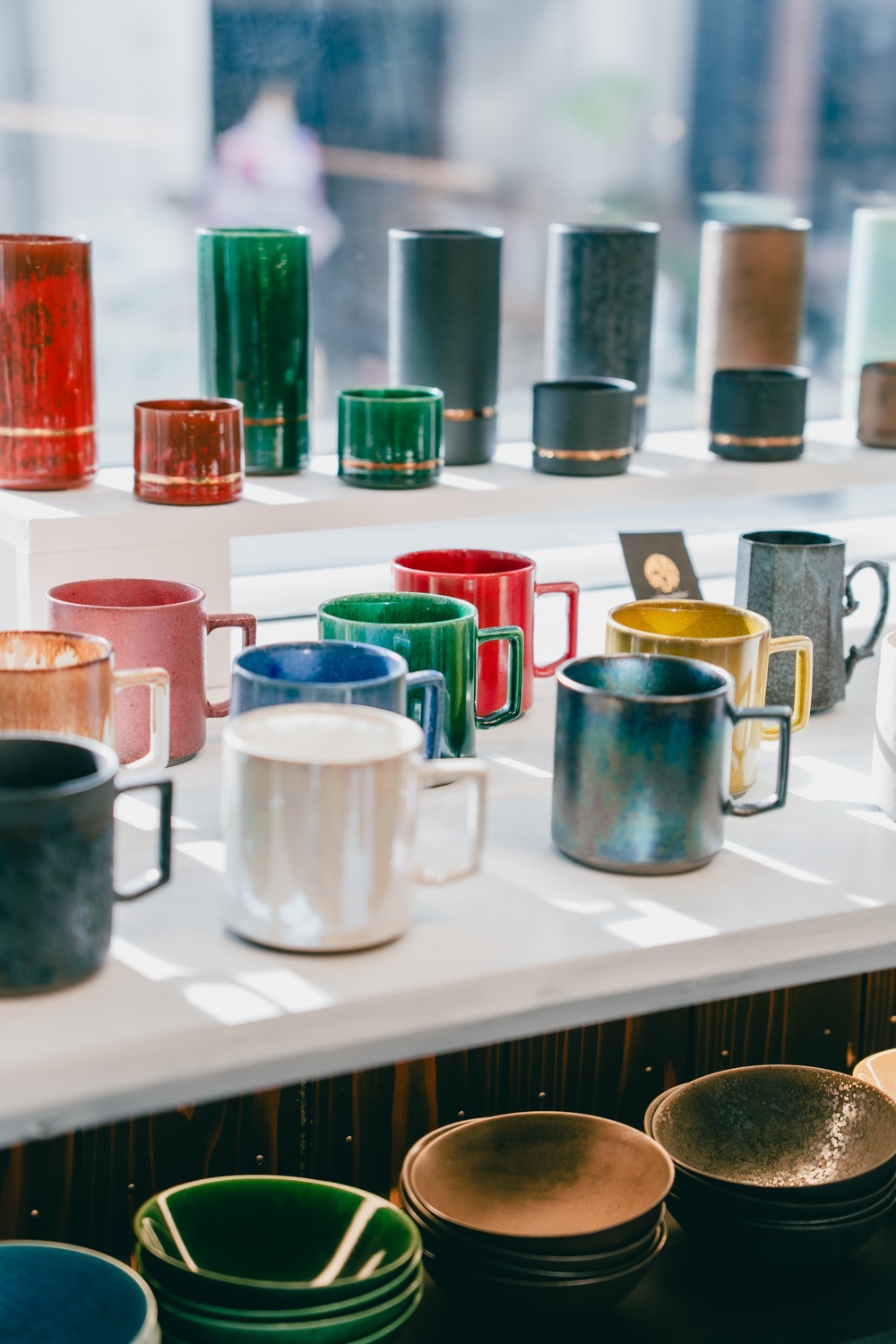 Mino-yaki ceramic cups suspended in the gallery